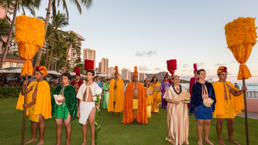 Festival in Hawaii buildings in the background along the beachline